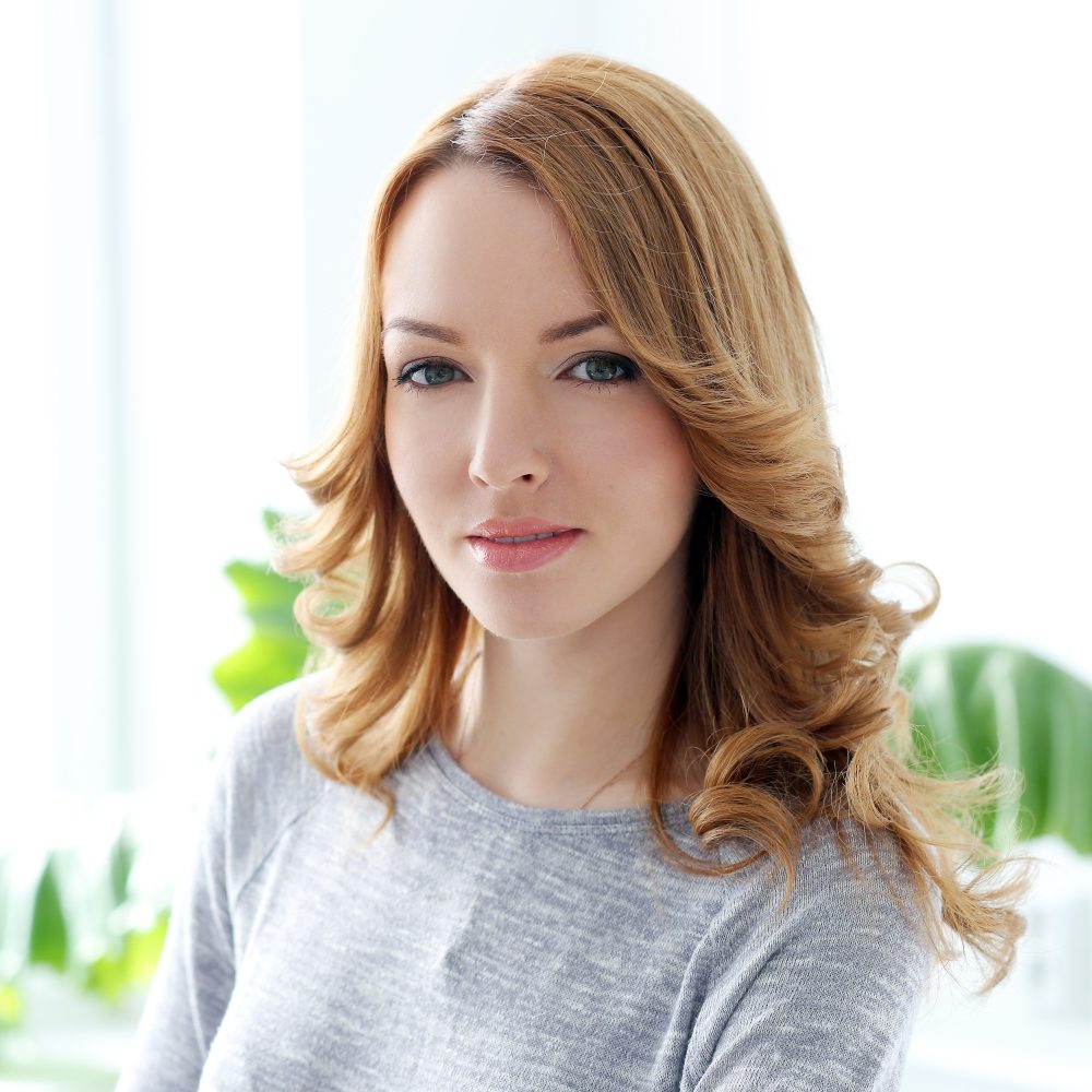 Lifestyle. Beautiful woman in the office