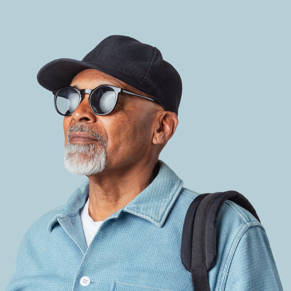 Senior black man wearing a cap and sunglasses mockup