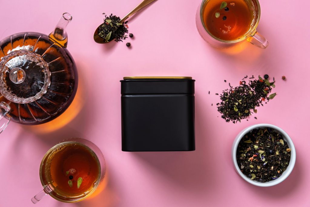 Blank tea packaging mockup with tea to display your branding design.