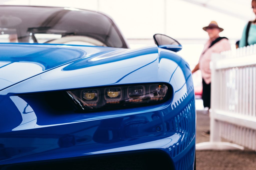 Closeup shot of a cool luxurious blue car ready to take on and take you to the stars