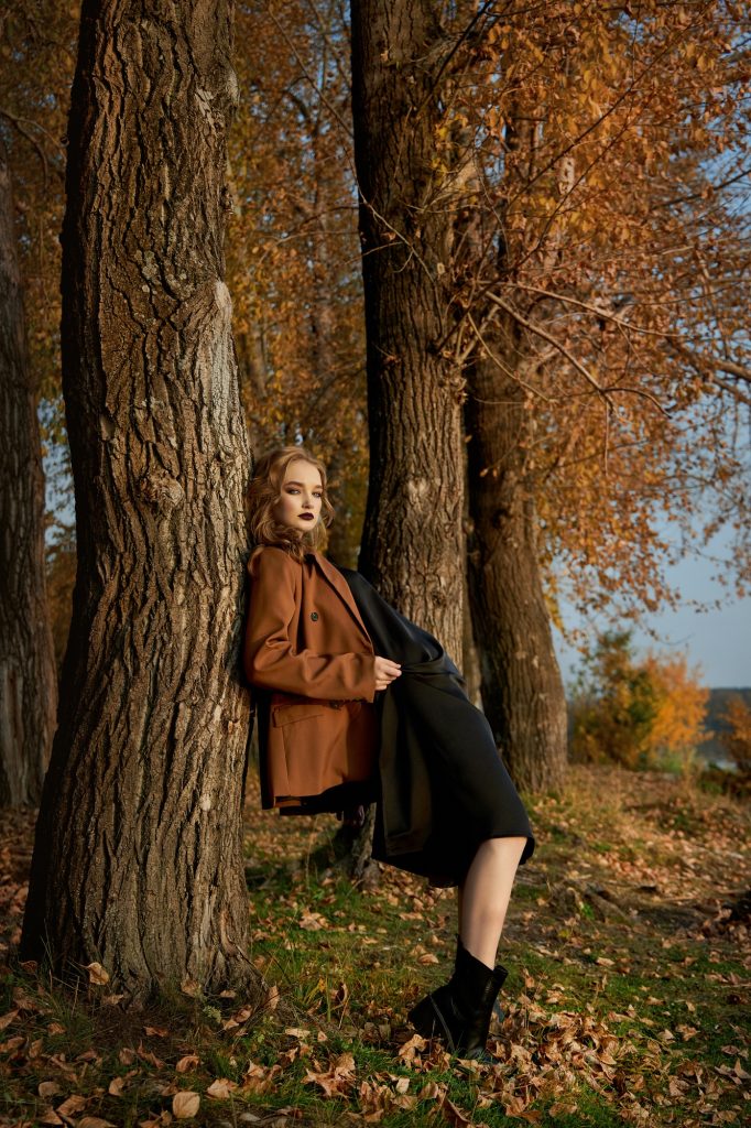 Beautiful portrait of a woman in the village countryside in nature in autumn
