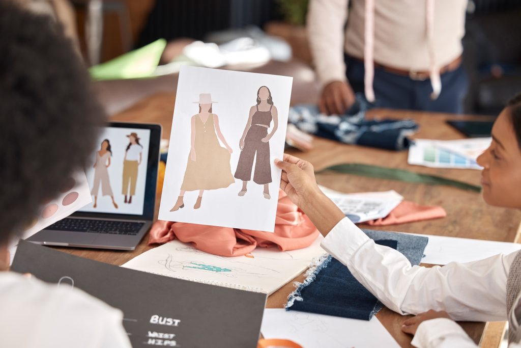 Fashion, design and sketch, team at workshop with ideas for color and textures for clothes. Creativ